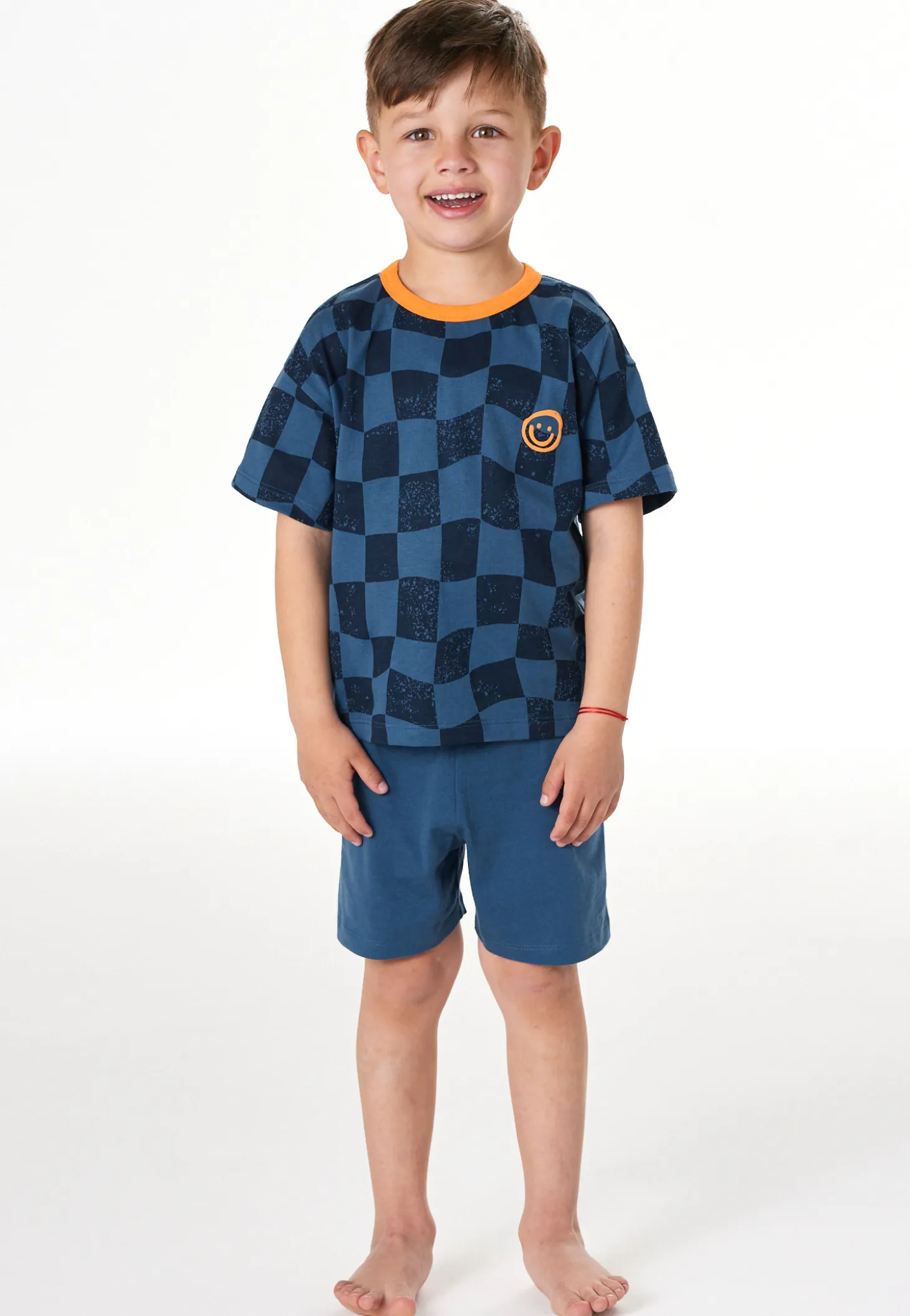 Schlafanzug kurz Smiley Karos atlantikblau - Kids Nightwear
